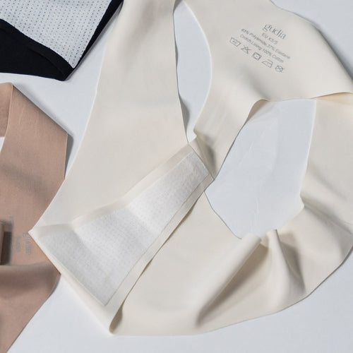 Close-up of Gudia white seamless thong, antibacterial organic cotton crotch and smooth bilayer fabric for breathable, irritation-free wear